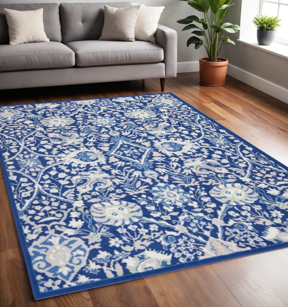5' X 7' Ivory And Blue Floral Area Rug
