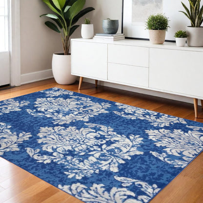 4' X 6' Ivory And Blue Damask Distressed Area Rug