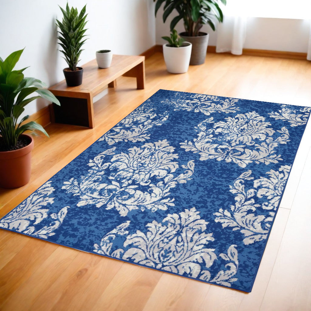 6' X 9' Blue And Ivory Floral Dhurrie Area Rug