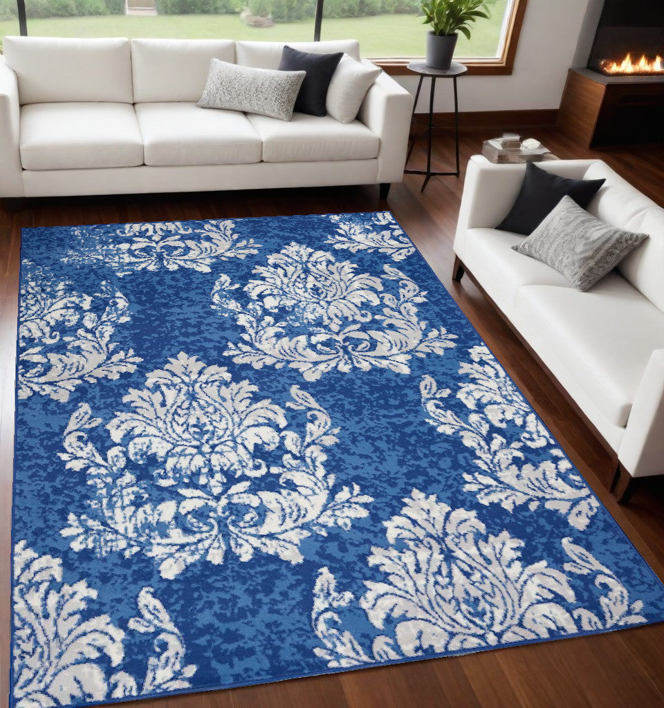 6' X 9' Blue And Ivory Floral Dhurrie Area Rug