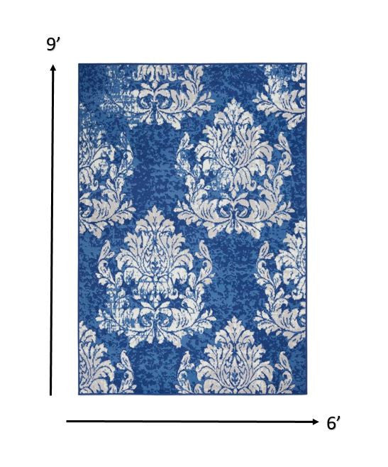 6' X 9' Ivory And Blue Damask Distressed Area Rug