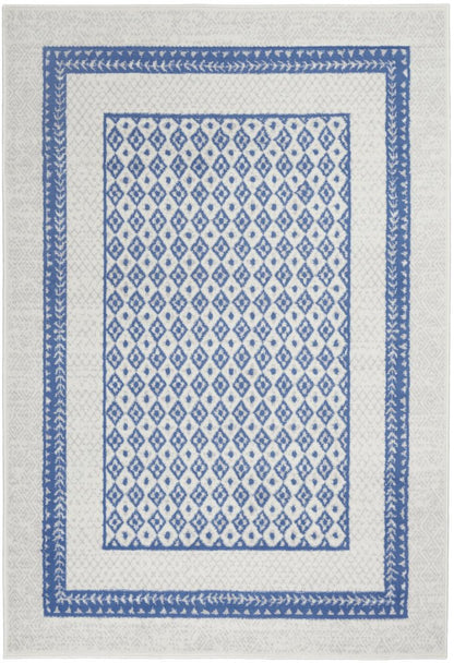 5' X 7' Ivory And Blue Geometric Area Rug