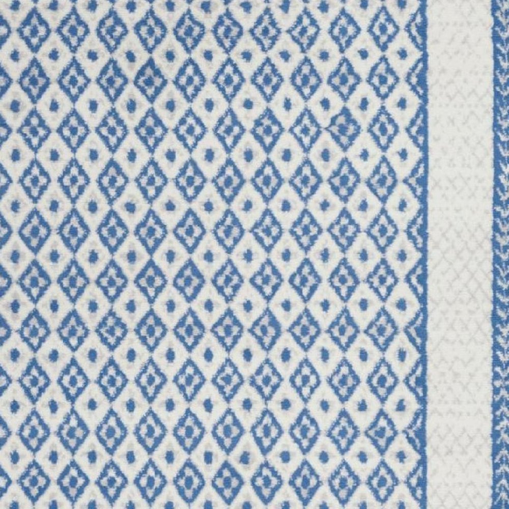 5' X 7' Ivory And Blue Geometric Area Rug