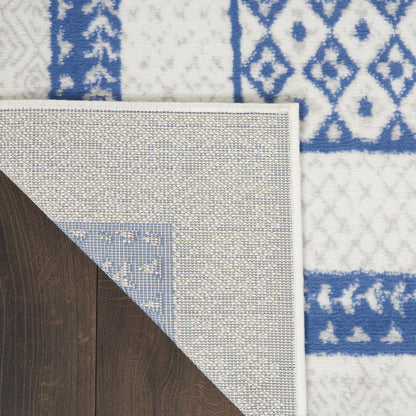 5' X 7' Ivory And Blue Geometric Area Rug