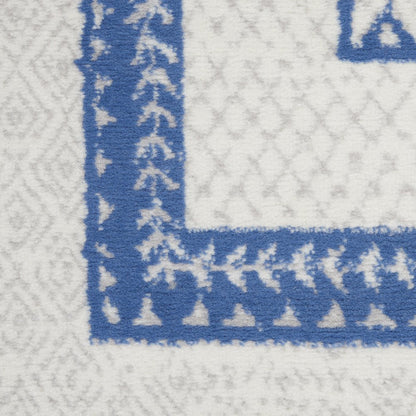 6' X 9' Ivory And Blue Geometric Area Rug