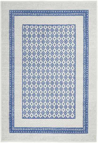 6' X 9' Ivory And Blue Geometric Area Rug