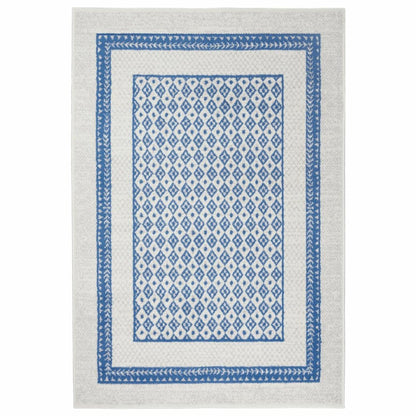 5' X 7' Ivory And Blue Geometric Area Rug