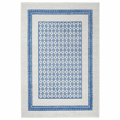 5' X 7' Ivory And Blue Geometric Area Rug