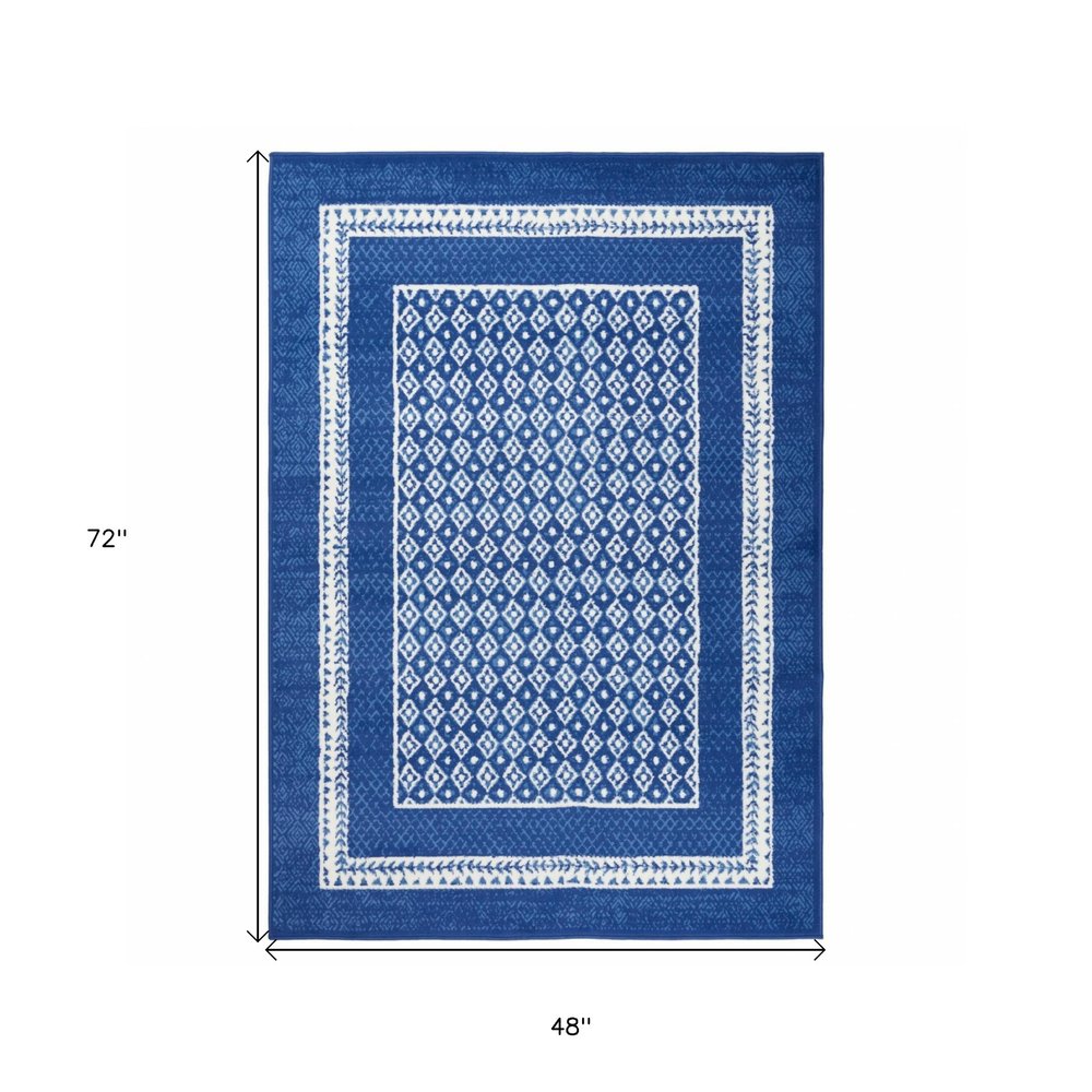 6' X 9' Blue And White Geometric Area Rug