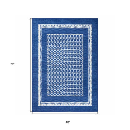 5' X 7' Blue And White Geometric Area Rug