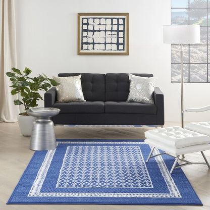 6' X 9' Blue And White Geometric Area Rug