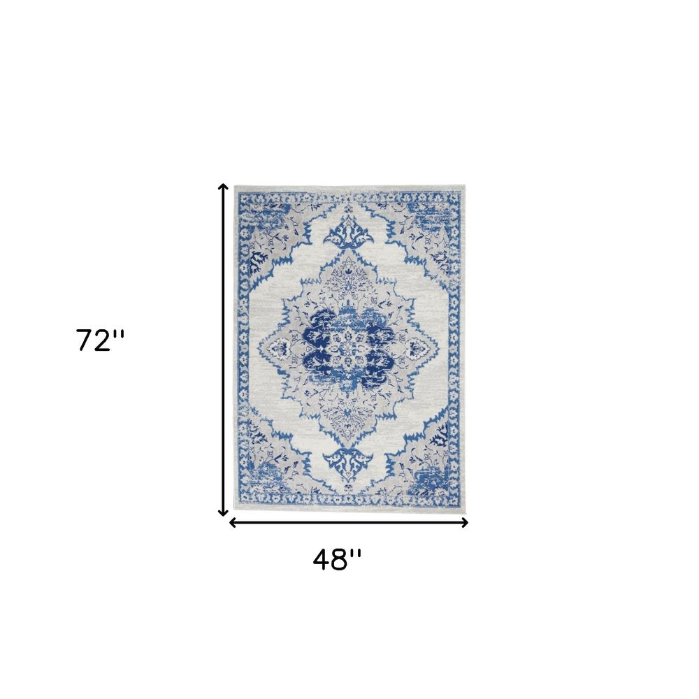 6' X 9' Ivory And Blue Floral Area Rug