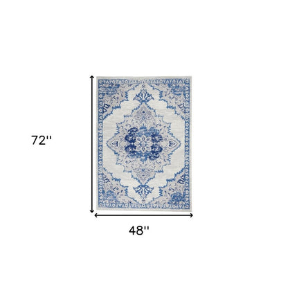 5' X 7' Ivory And Blue Medallion Area Rug
