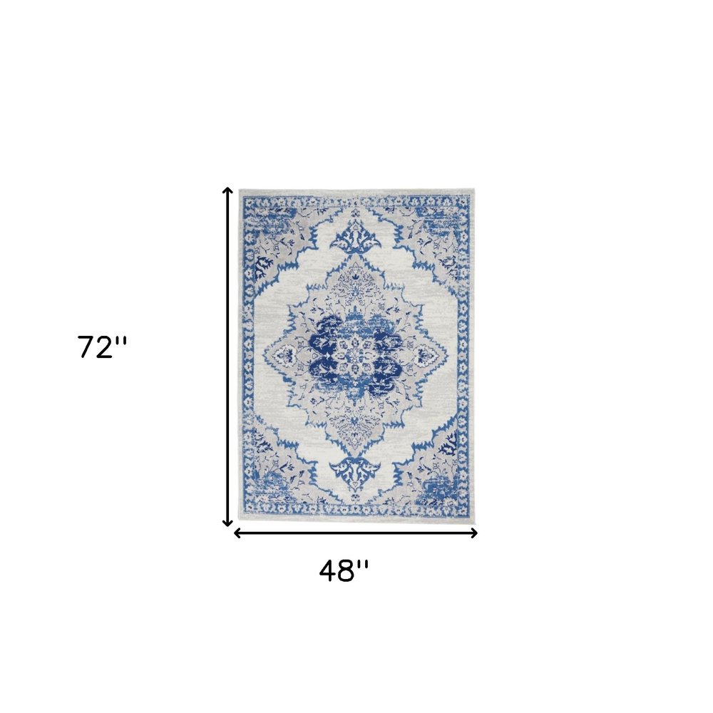 6' X 9' Ivory And Blue Floral Area Rug
