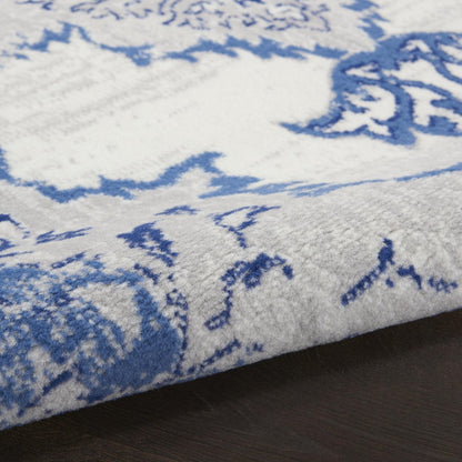 5' X 7' Ivory And Blue Medallion Area Rug