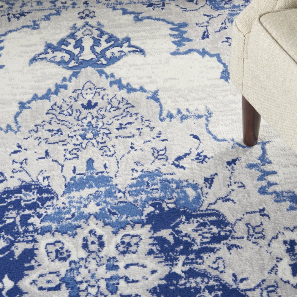 6' X 9' Ivory And Blue Floral Area Rug
