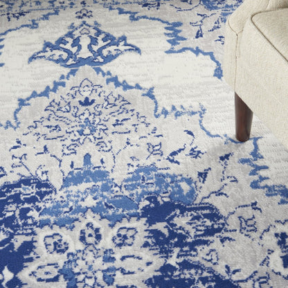 6' X 9' Ivory And Blue Floral Area Rug