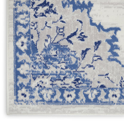 5' X 7' Ivory And Blue Medallion Area Rug