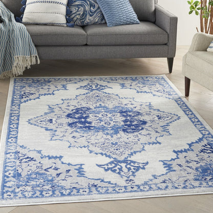 5' X 7' Ivory And Blue Medallion Area Rug