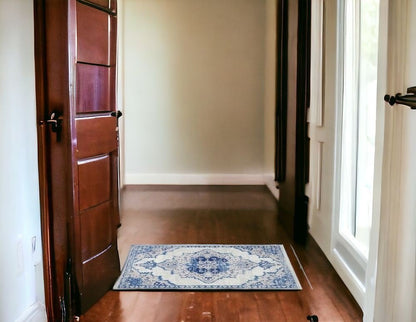 5' X 7' Ivory And Blue Medallion Area Rug