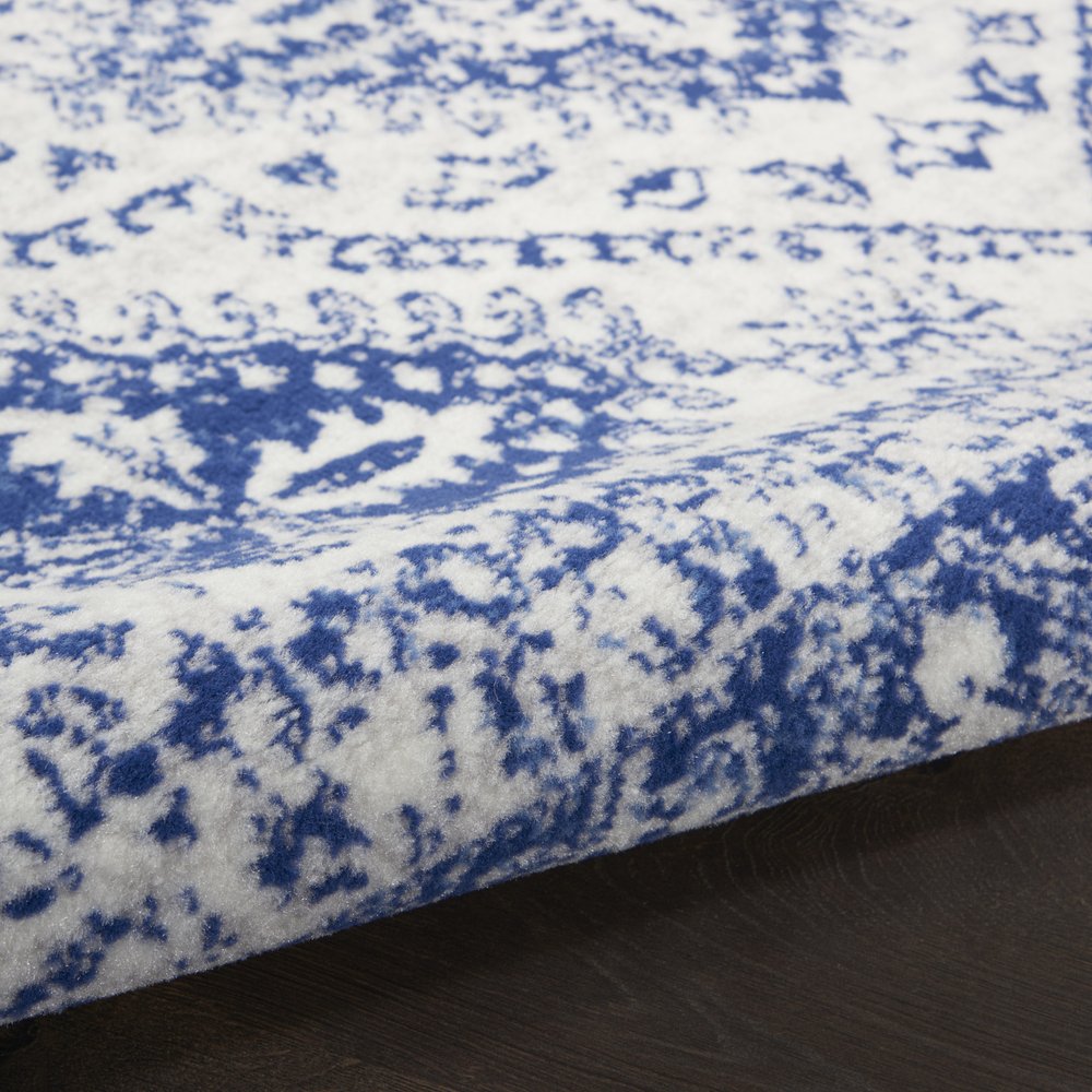 4' X 6' Ivory And Blue Geometric Distressed Area Rug