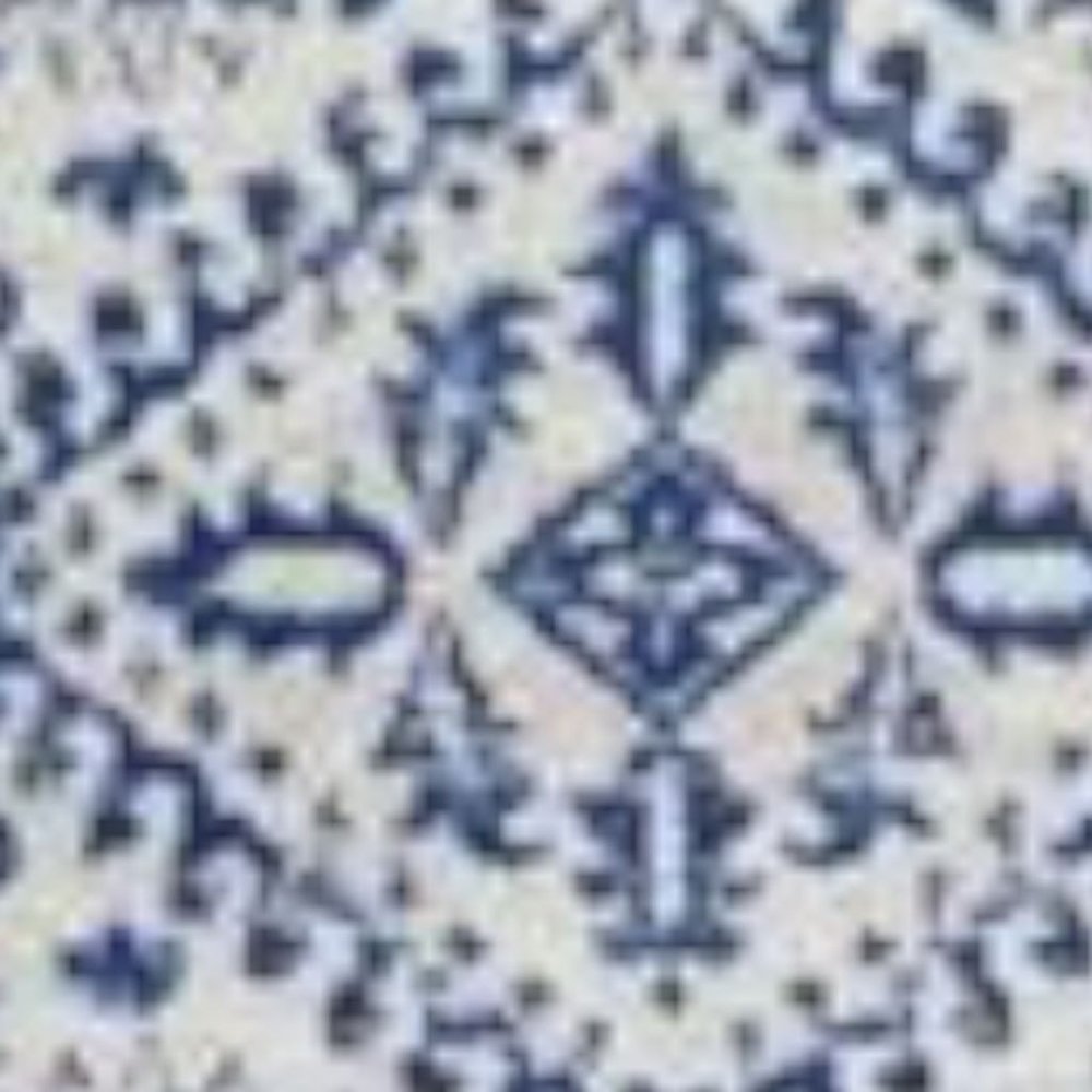 5' X 7' Ivory And Blue Geometric Distressed Area Rug