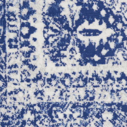 5' X 7' Ivory And Blue Geometric Distressed Area Rug