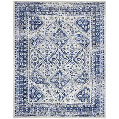 5' X 7' Ivory And Blue Geometric Distressed Area Rug