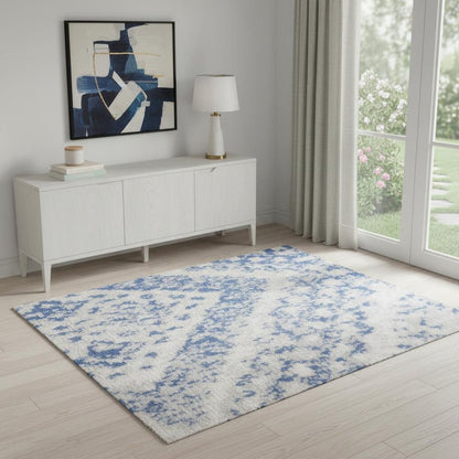 5' X 7' Ivory And Blue Geometric Area Rug