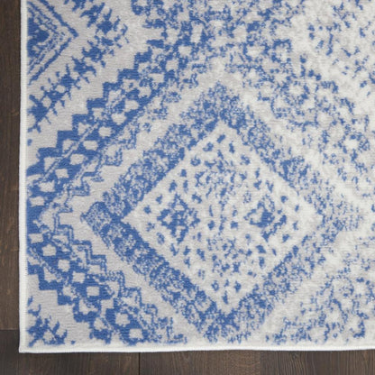 5' X 7' Ivory And Blue Geometric Area Rug