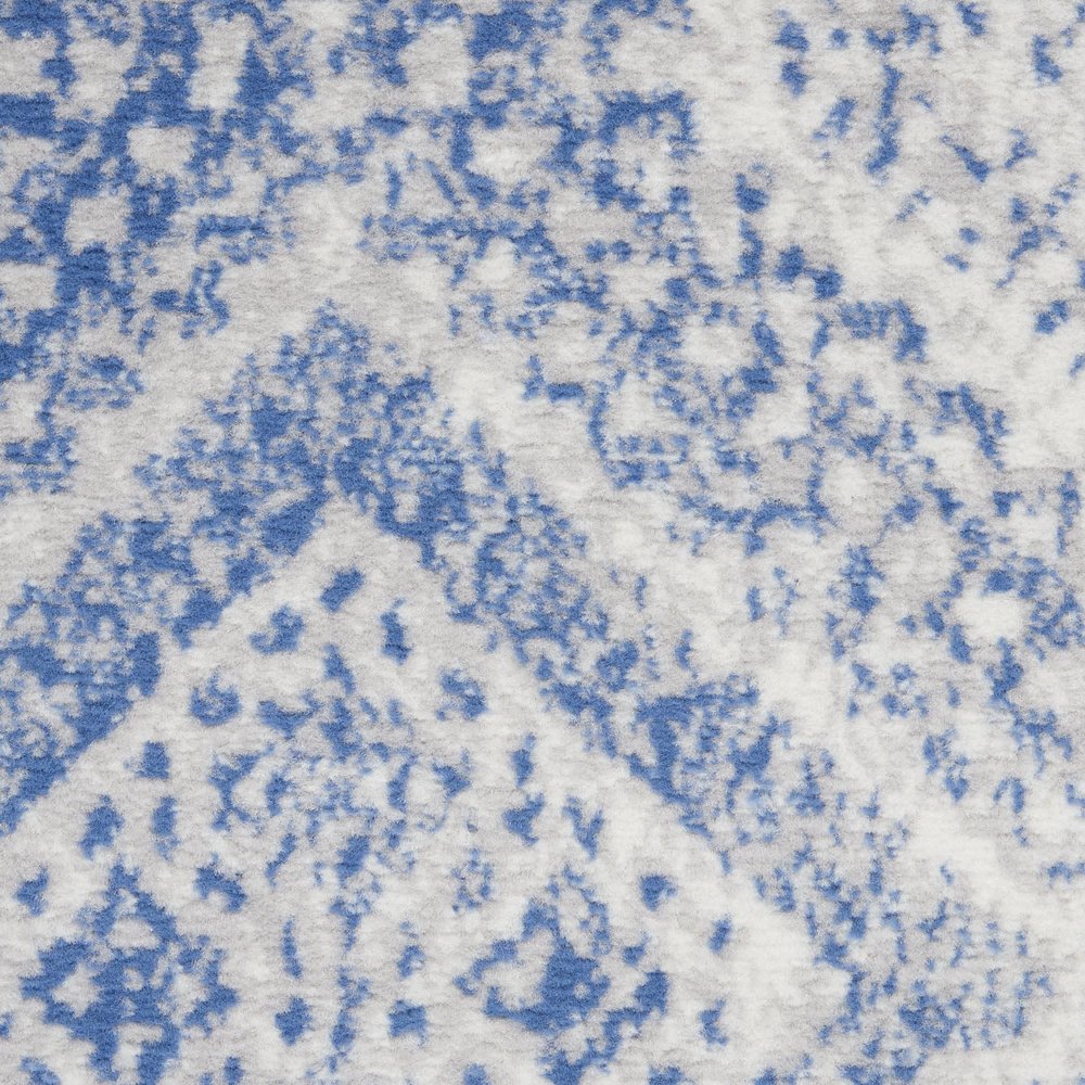 5' X 7' Ivory And Blue Geometric Area Rug
