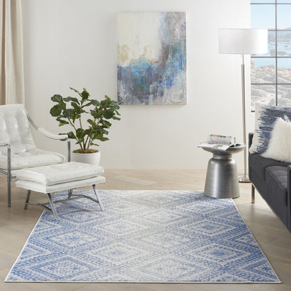 4' X 6' Ivory And Blue Geometric Area Rug