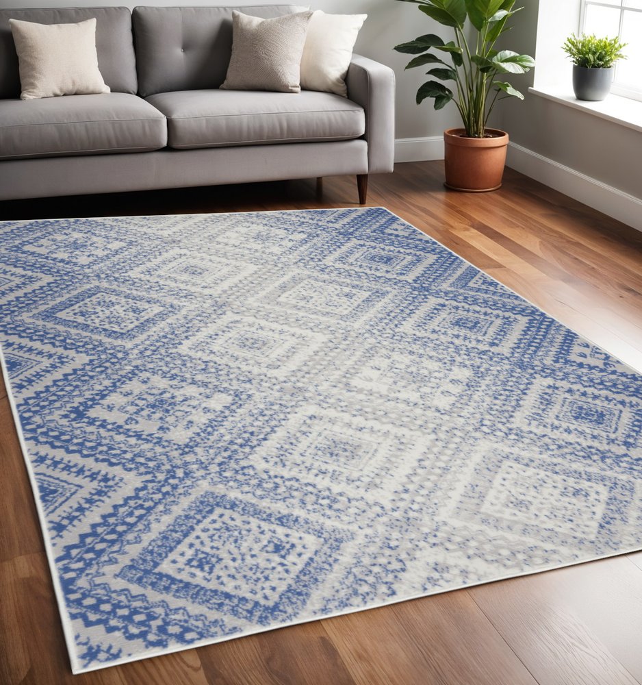 4' X 6' Ivory And Blue Geometric Area Rug