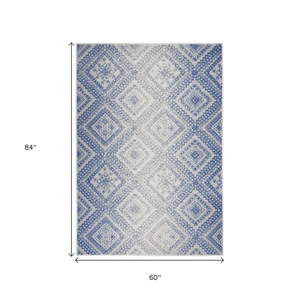 4' X 6' Ivory And Blue Geometric Area Rug