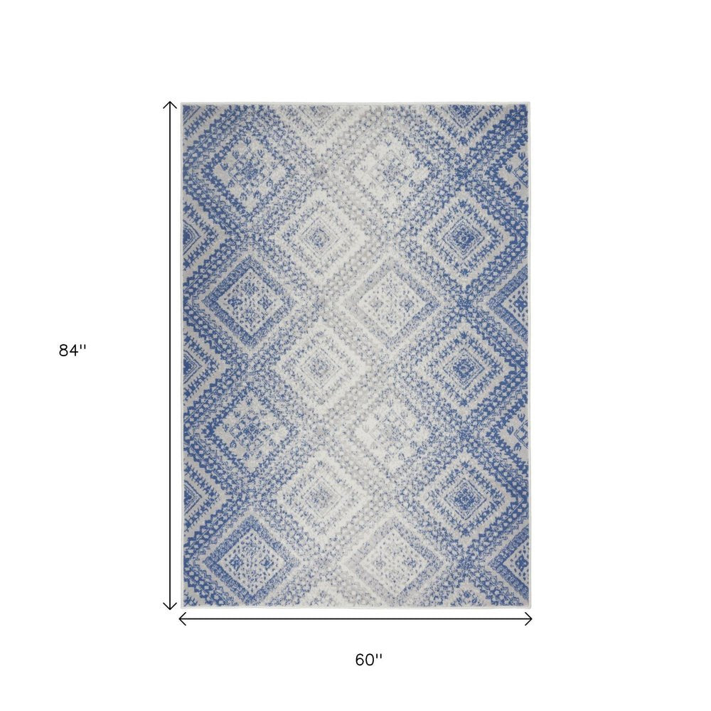 5' X 7' Ivory And Blue Geometric Area Rug