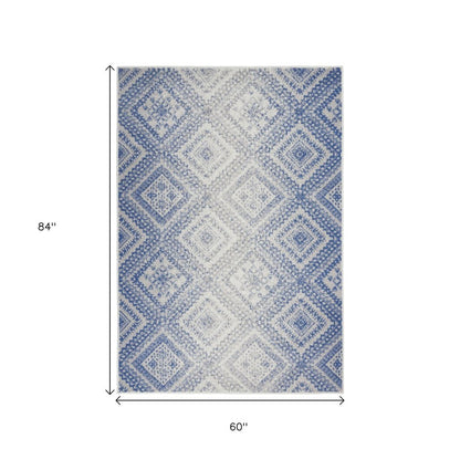 5' X 7' Ivory And Blue Geometric Area Rug