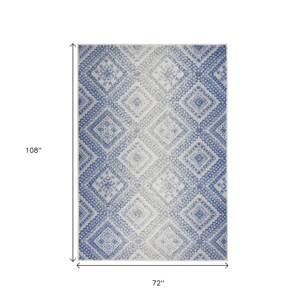 4' X 6' Ivory And Blue Geometric Area Rug