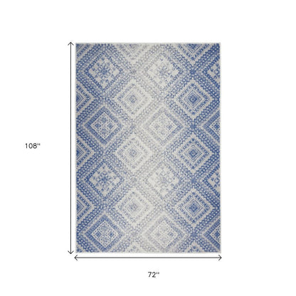 4' X 6' Ivory And Blue Geometric Area Rug