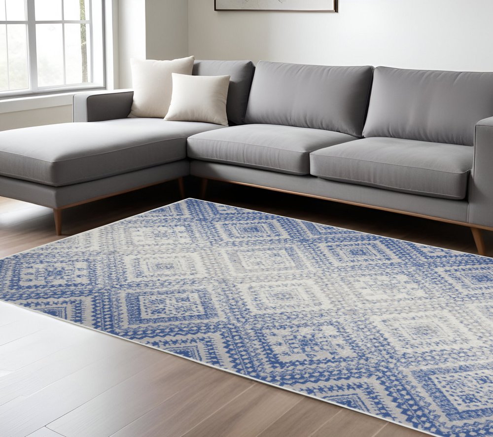 4' X 6' Ivory And Blue Geometric Area Rug