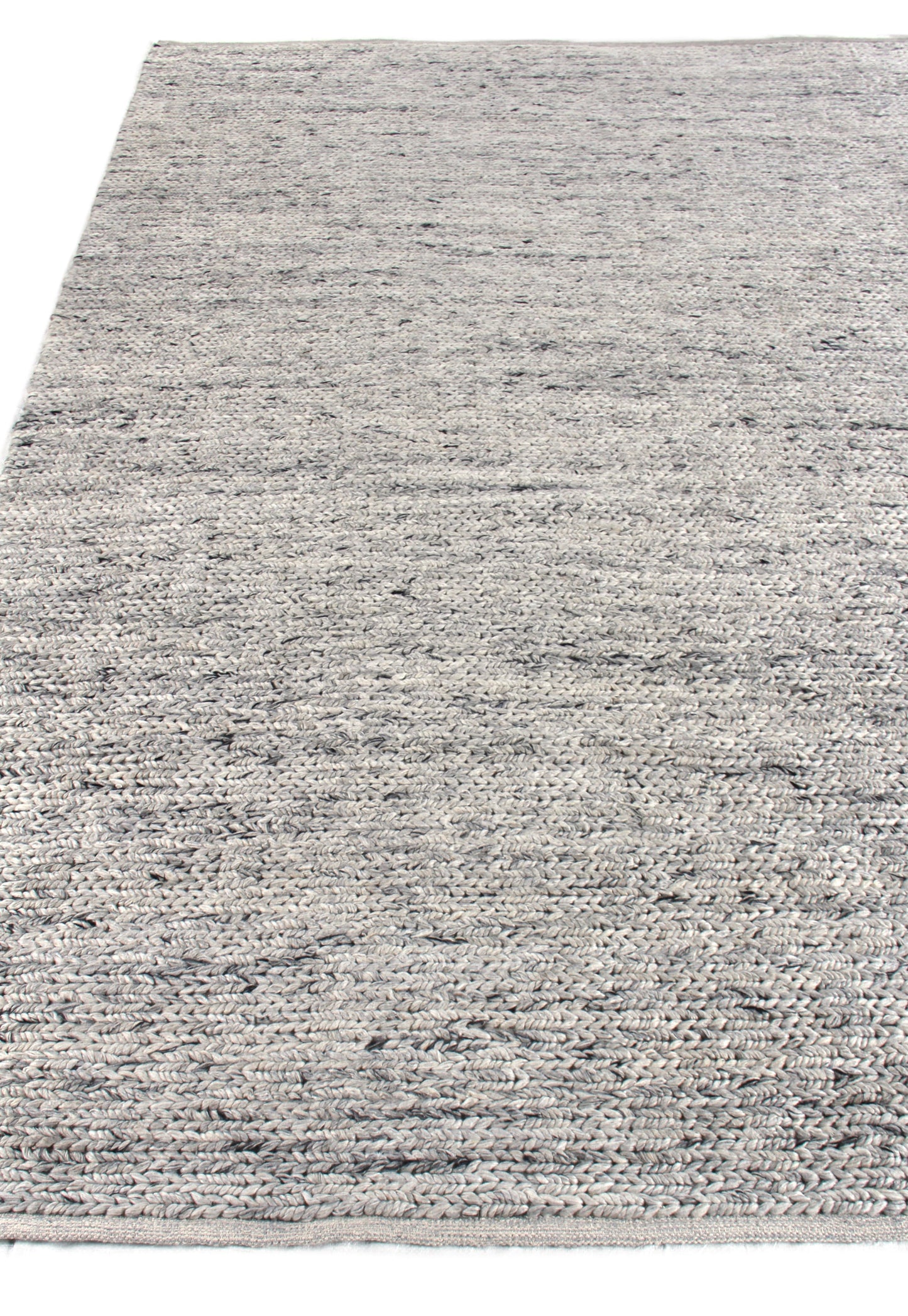 Gray speckled hand-woven rug with subtle blue/charcoal flecks; neutral, versatile living-room accent.