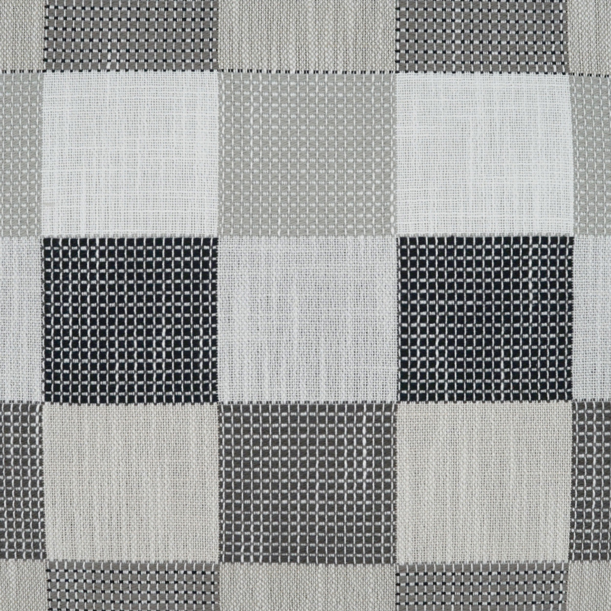 Neutral gray checkerboard woven fabric with alternating light and dark squares; textured upholstery textile.