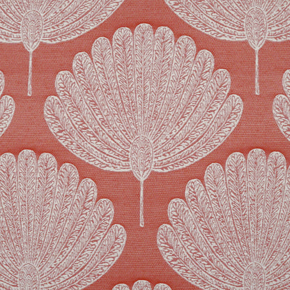 Orange fabric with white floral motifs in a repeating pattern.
