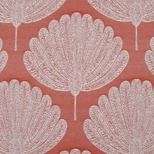 Red fabric with large white palm-leaf fan motifs, repeating decorative textile pattern.