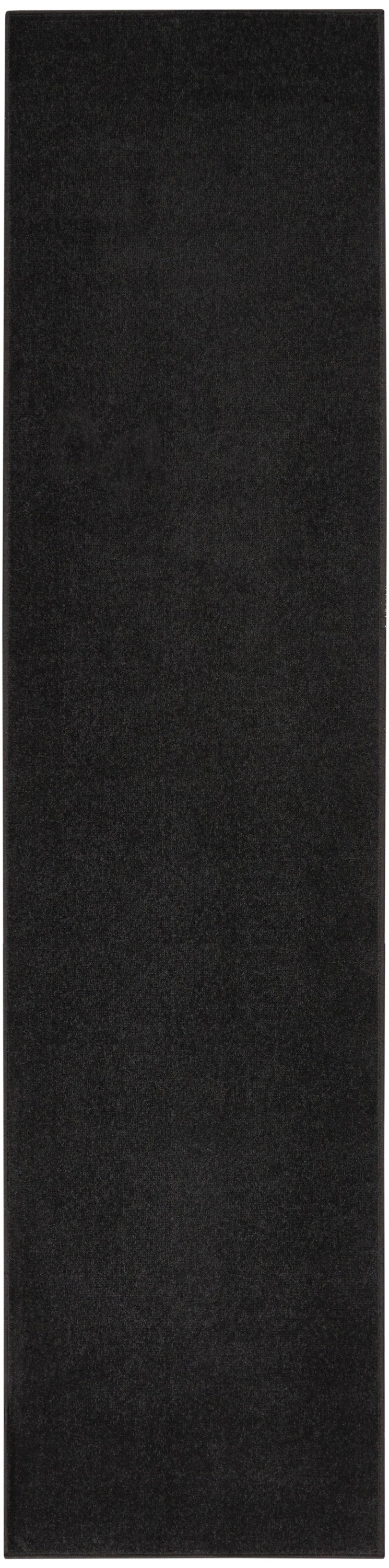 Long black rectangular felt rug runner with a soft, textured surface.