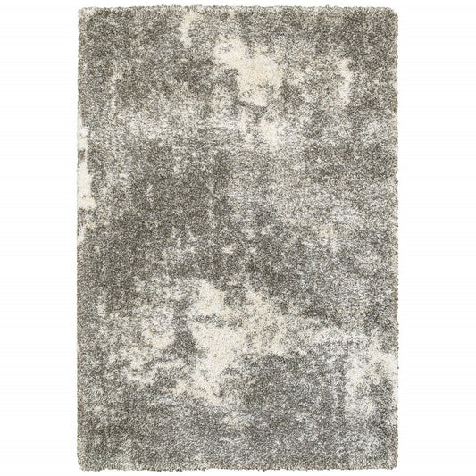 7' X 10' Gray And Ivory Distressed Abstract Area Rug