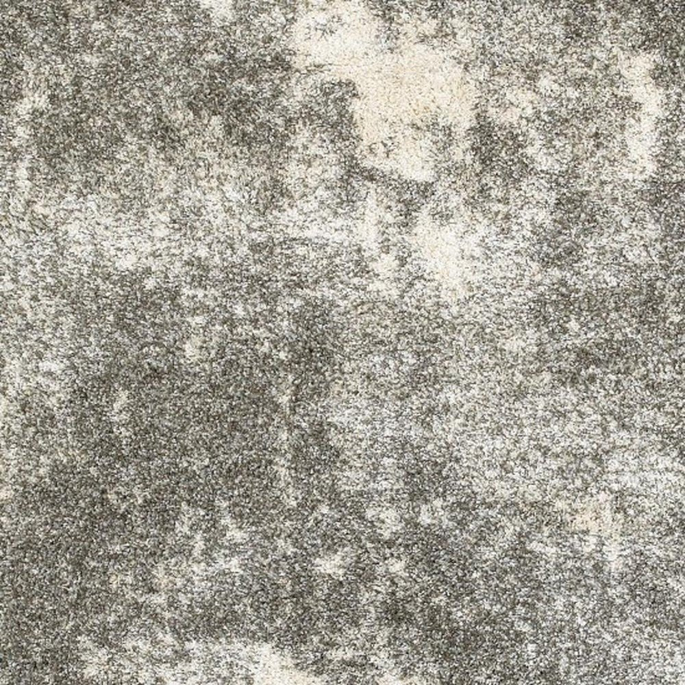 7' X 10' Gray And Ivory Distressed Abstract Area Rug