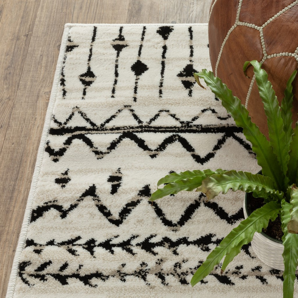 5’ X 7’ Ivory And Black Eclectic Patterns Indoor Area Rug