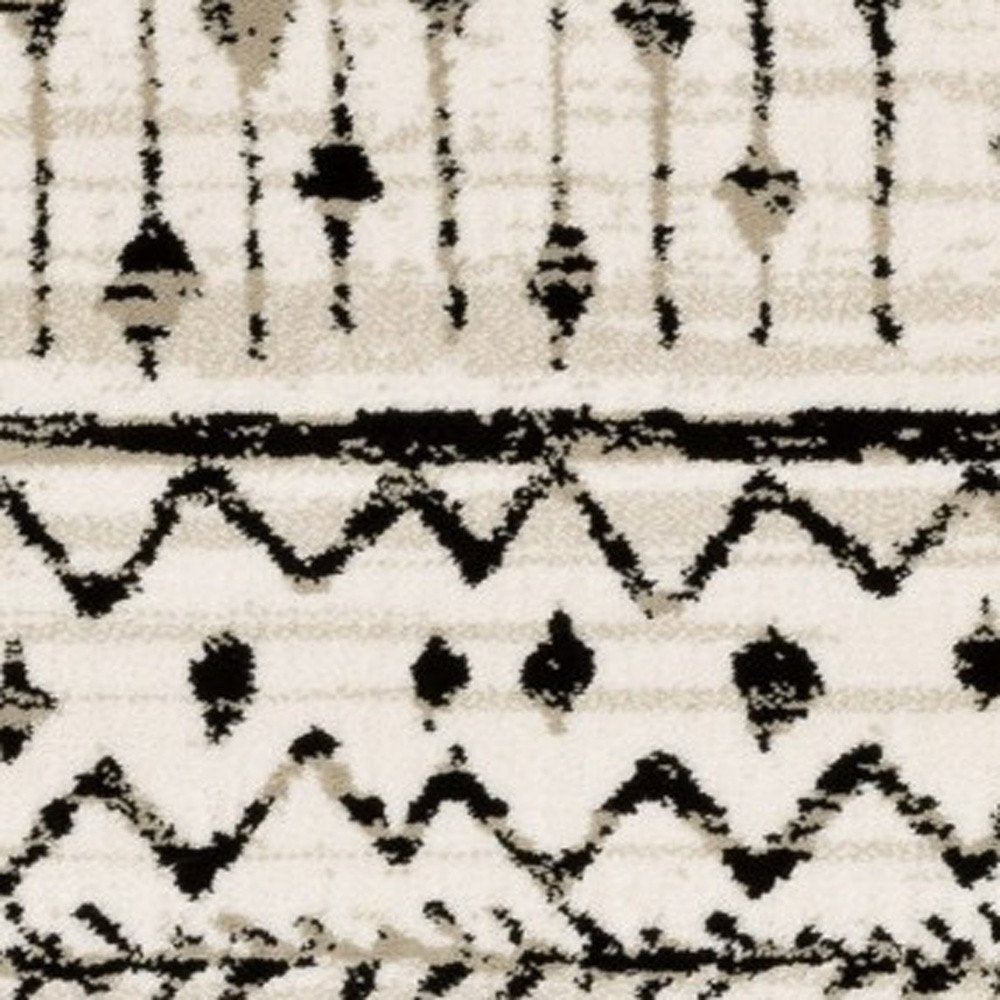 5' X 7' Ivory And Black Abstract Geometric Distressed Area Rug
