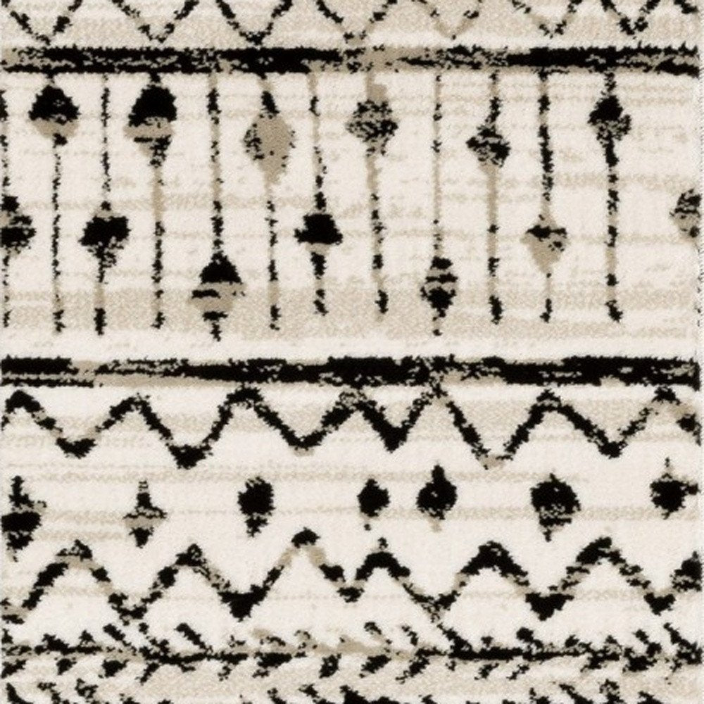 7' X 9' Ivory And Black Abstract Geometric Area Rug