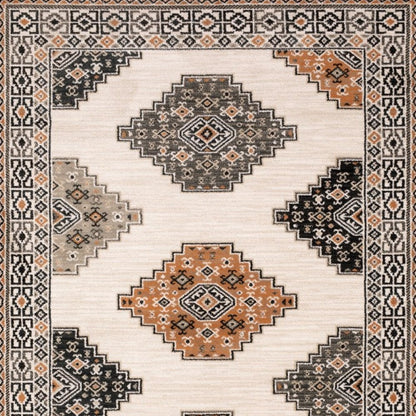 4' X 6' Ivory Black Orange And Gray Geometric Area Rug